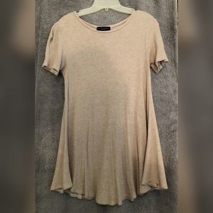 Tan tunic.
